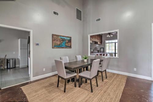 a dining room with a table and chairs at Starkvegas Clubhouse about 2 Mi to MSU Campus! in Starkville
