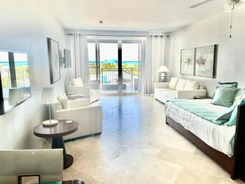 Private Poolside, Loft-Like Condo with Panoramic Grace Bay Views, Walk to Beach, Restaurants, & Turtle Cove Marina!