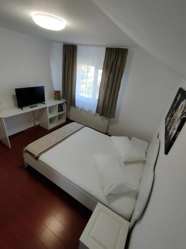 Katil atau katil-katil dalam bilik di "Apartament"-Casa Genius