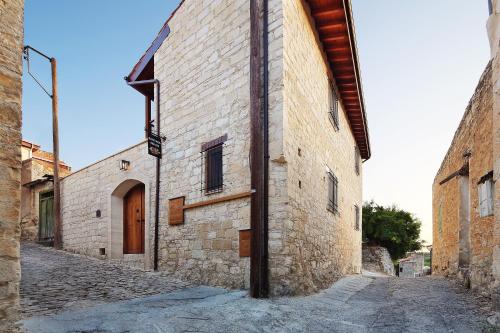 an alley in an old stone building at KANTARA HOUSE - A Rural Retreat of Comfort & Class! in Arsos