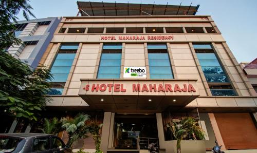 a hotel marawi building with a sign on it at Treebo Trend Maharaja Residency in Jaipur