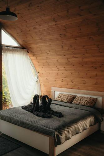 Postel nebo postele na pokoji v ubytování Akmeni Nature Resort