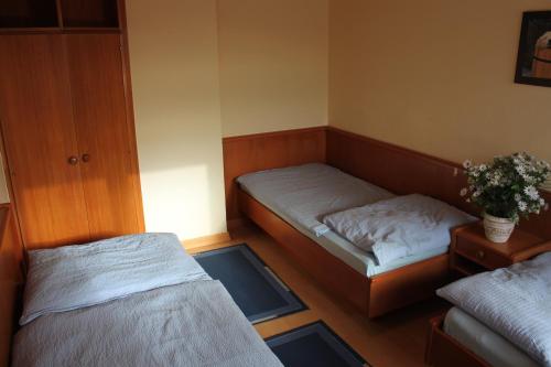 Ein Bett oder Betten in einem Zimmer der Unterkunft Appartementhaus Waba