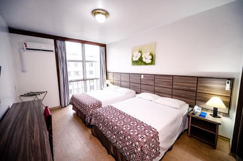 Cama ou camas em um quarto em Hotel Dan Inn Planalto São Paulo