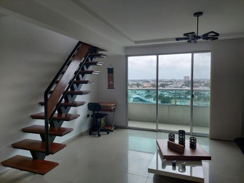 Gimnasio o instalaciones de fitness de Acogedor y moderno loft con vista a la ciudad