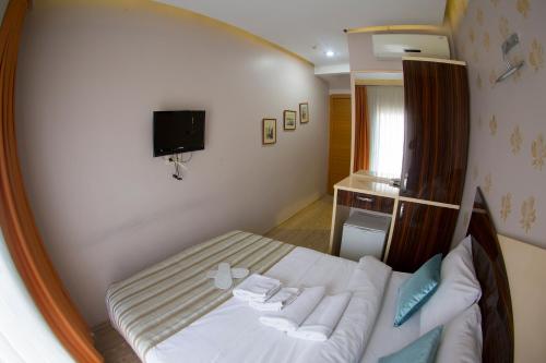 Postel nebo postele na pokoji v ubytování Ottoman Time Hotel
