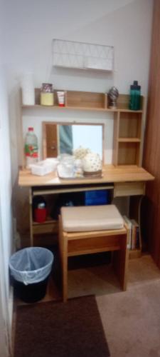 a toy desk with a stool and a table at Leicester City centre en suite budget room for 1 in 2 bed apartment in Leicester