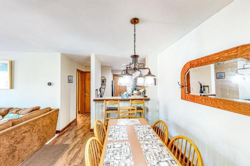 a dining room and kitchen with a table and chairs at All Season Mountain Retreat in Dover