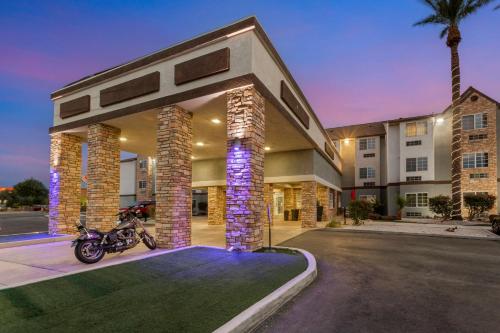 a motorcycle parked in front of a building at Best Western Plus Yuma Foothills Inn & Suites in Yuma
