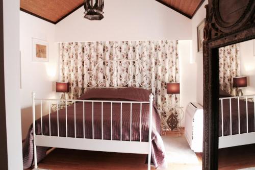 Postel nebo postele na pokoji v ubytování Casa de Sao Cosmado