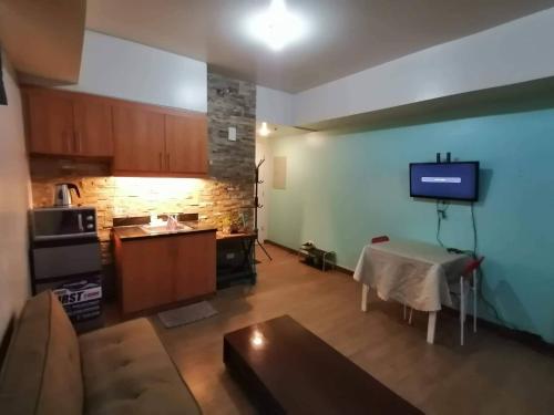 Η κουζίνα ή μικρή κουζίνα στο Celadon Tower- Studio with balcony near SM San Lazaro