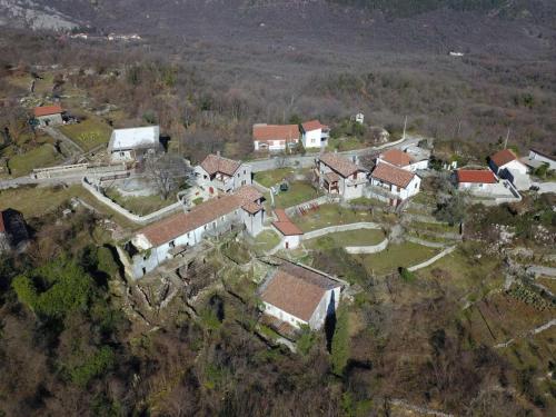 an aerial view of a house on a hill at Bed & Wine Djonovic in Virpazar