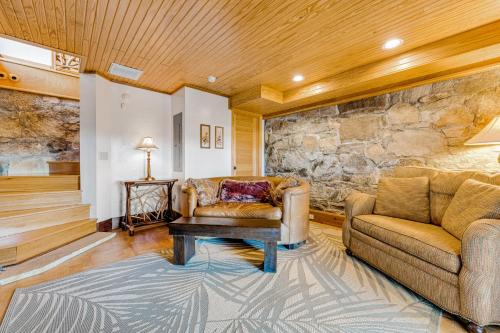 a living room with a couch and a table at The Potato House in Banner Elk