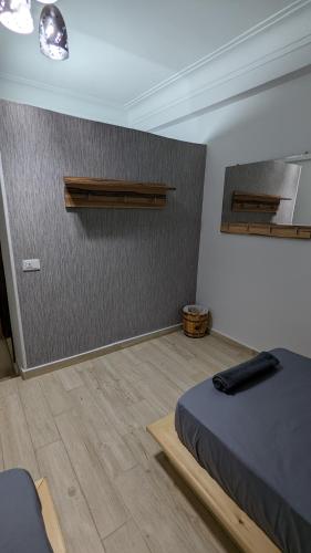 Postel nebo postele na pokoji v ubytování Champollion Hostel