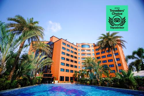 La alberca dentro o cerca de Ramada by Wyndham Alleppey