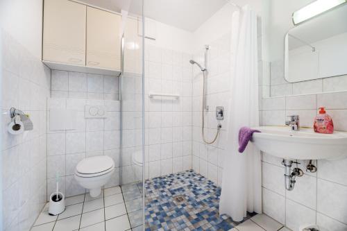 Ένα μπάνιο στο Hotel am Kirchplatz