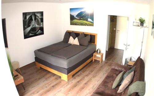 a bedroom with a bed in a room at Appartement Kaprun4You in Kaprun