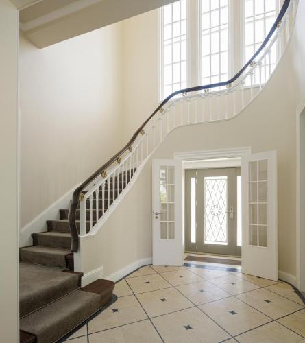 a staircase in a home with a stair case at Casa Kala in Porto