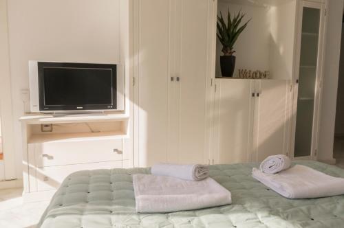 Posteľ alebo postele v izbe v ubytovaní Orilla beach house