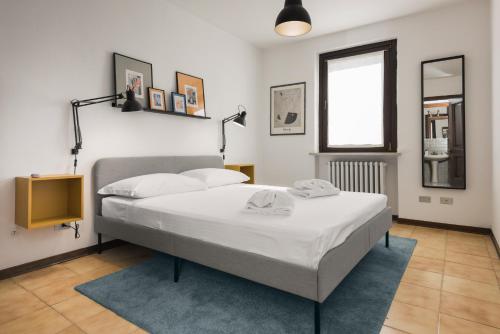 Posteľ alebo postele v izbe v ubytovaní Flats4rent Sabotino