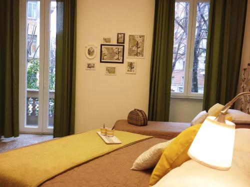 Postel nebo postele na pokoji v ubytování Domò Vaticano Guest House