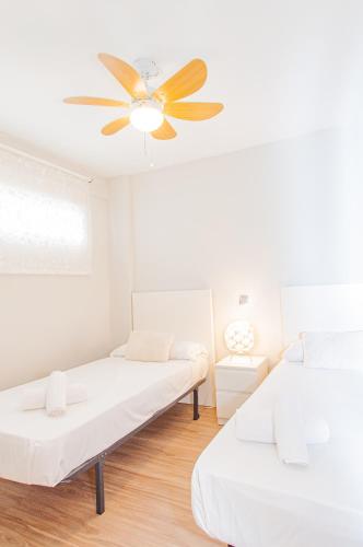 Postel nebo postele na pokoji v ubytování MyFlats Azul