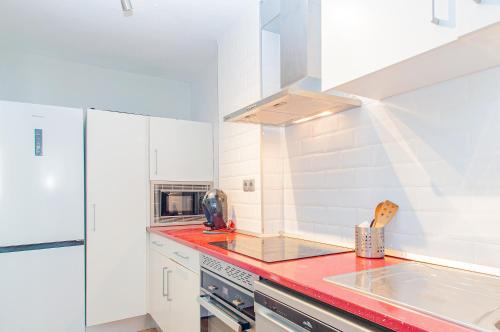 Kuchyň nebo kuchyňský kout v ubytování MyFlats Azul