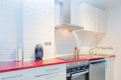 Kuchyň nebo kuchyňský kout v ubytování MyFlats Azul