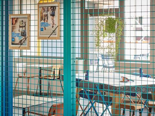 Reštaurácia alebo iné gastronomické zariadenie v ubytovaní ibis budget Nancy Laxou