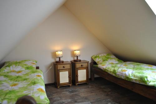 Tempat tidur dalam kamar di Dom Bartek