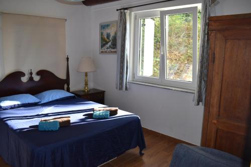 Postel nebo postele na pokoji v ubytování Villa Viola