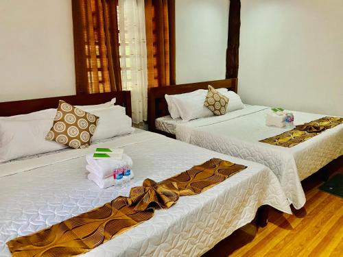 Ένα ή περισσότερα κρεβάτια σε δωμάτιο στο Sophias Beach Guest House