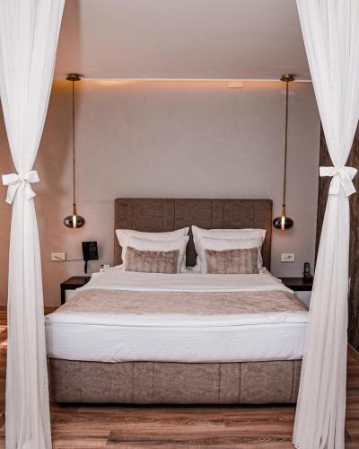 Cama o camas de una habitación en Hotel Driada