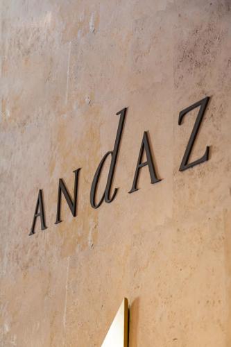a sign on the side of a building at Andaz Condesa Mexico City, By Hyatt in Mexico City
