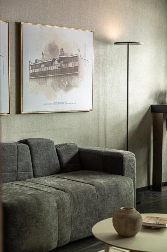 a living room with a couch and a table at Andaz Condesa Mexico City, By Hyatt in Mexico City