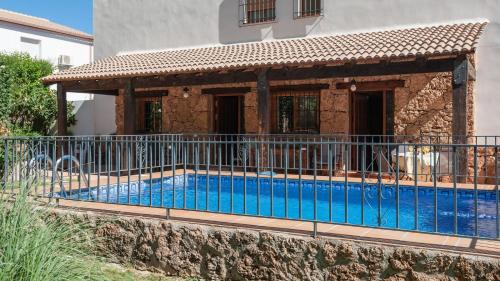 Casa Rural La Ventilla Arbuniel by Ruralidays游泳池或附近泳池