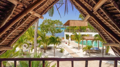 a view of the beach from a resort window at The Mida Creek Hotel in Watamu