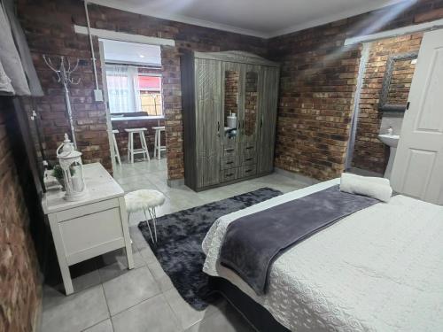 Katil atau katil-katil dalam bilik di Zhantique Airport Guest House Unit 3