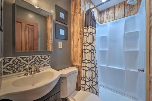 a bathroom with a sink and a shower at Rustic Clint Eastwood Ranch Apt by Raystown Lake in Huntingdon