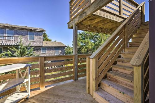 a large deck with wooden stairs and a pergola at Walk to Bay and Boat Launch Beach House in Avon in Avon