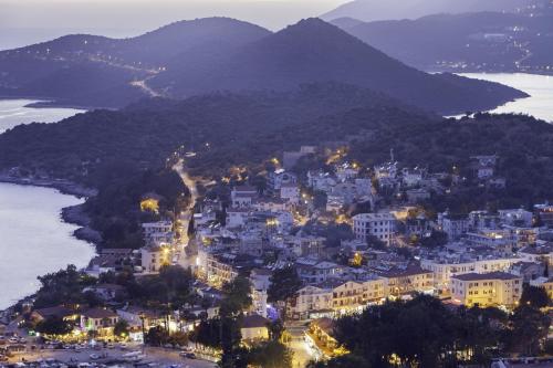 an aerial view of a town on a hill next to the water at Hideaway in Kas
