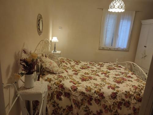 Een bed of bedden in een kamer bij Casedda Ostunese