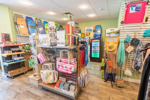 a store with surfboards and bags in a store at Grand Hotel Cape May in Cape May