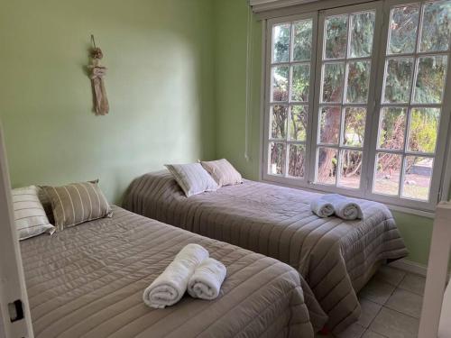 Ένα ή περισσότερα κρεβάτια σε δωμάτιο στο Cabaña Patagónica