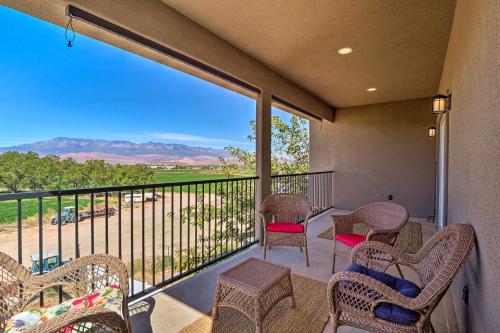 a balcony with chairs and a view of the mountains at Hurricane Getaway with Yard - 25 Mi to Zion! in Hurricane