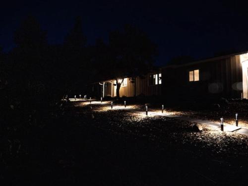 a group of lights in front of a building at night at Pool! Quite, Private, remodeled home on the hill in Placerville