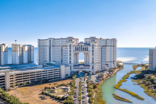 an aerial view of a city with a river and buildings at Madiera Magic in Myrtle Beach