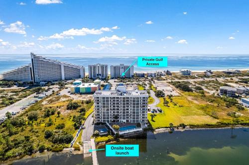 an aerial view of a resort with the ocean at SeaSpray East E0122 in Perdido Key