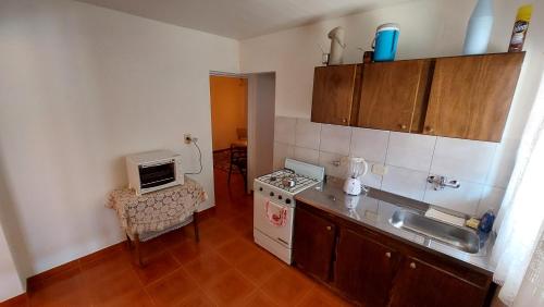 a kitchen with a sink and a counter top at Su y Nacho in Puerto Rico