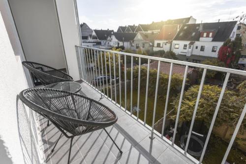 Балкон или терраса в Koje Eins I Großes Apartment mit 2 Schlafzimmern